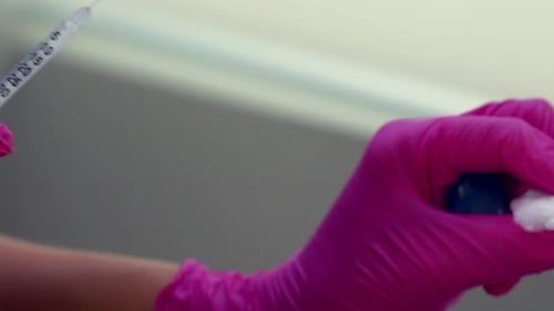 Hands Prepare Woman for Cosmetic Procedure