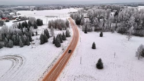 Driving on a country road in winter.