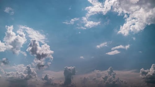 Clouds Moving in Blue Sky
