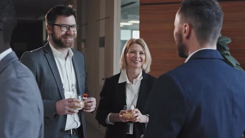 Business People Enjoying Small Party