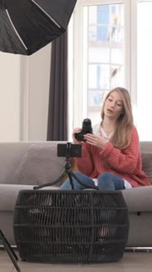 Influencer Reviewing Camera on Live Stream