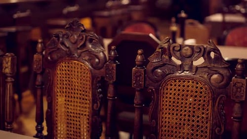 Antique, Decorative Wooden Chairs in the Restaurant