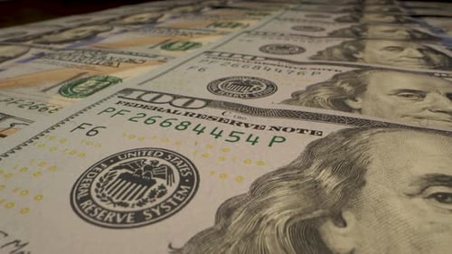 Close Up View Of Stacked One Hundred Dollar Bills