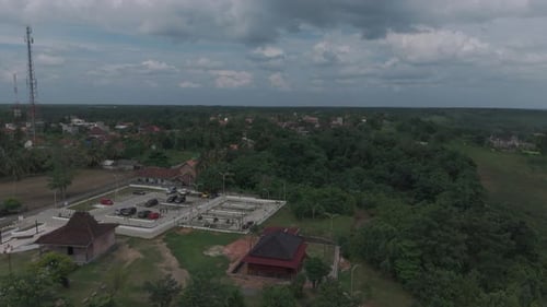 Aerial View Of A Construction Site Surrounded By Trees