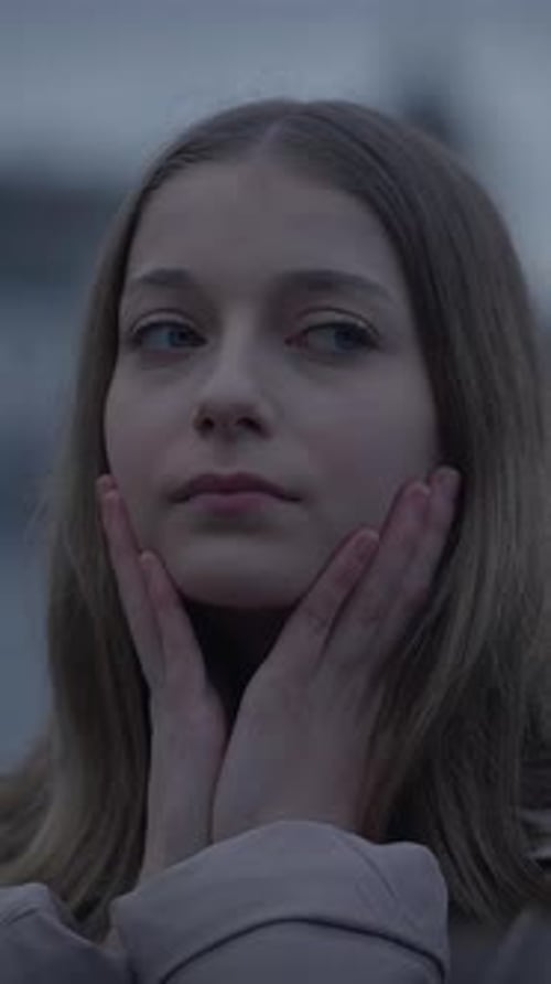 Young Woman With Blonde Hair Posing Outdoors