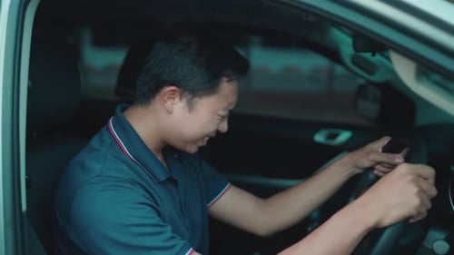 Frustrated Man Leans Back in Driver's Seat