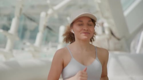 Young Woman Running in an Urban Setting