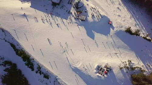Aerial View of Skiers and Snowboarders in Winter