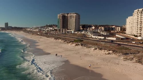 Aerial View Of Blouberg Beach On A Sunny Summer Day In Cape Town, South Africa - drone shot
