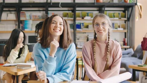 Students Smiling in a Bright Classroom