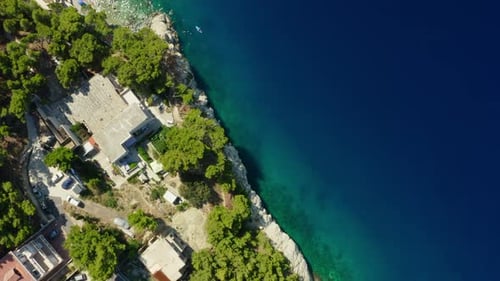 Hotels and houses on the seafront. Seaside tourist town on the coast of Croatia.
