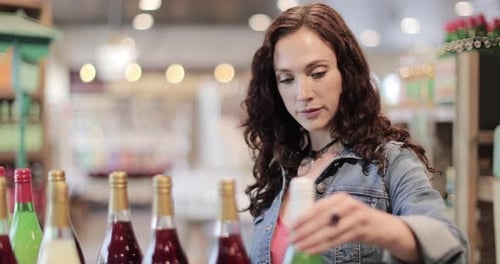 Young adult female shopping in a grocery store
