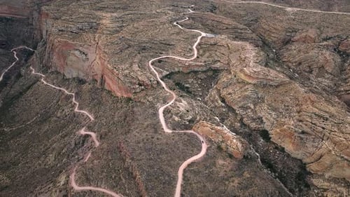 Aerial view of winding road through desert landscape, United States.