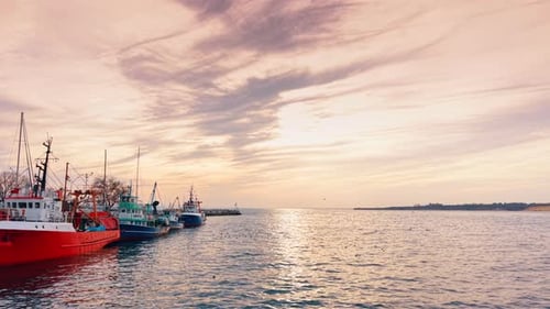 Footage along the row of the boats standing at the quay.