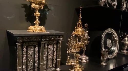 Visitors walking around the museum and magnificent historical antiques