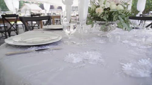 Elegant Wedding Table Setting with Floral Centerpiece