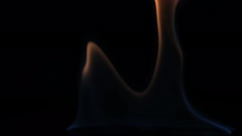 Dramatic Flames Flicker in the Dark