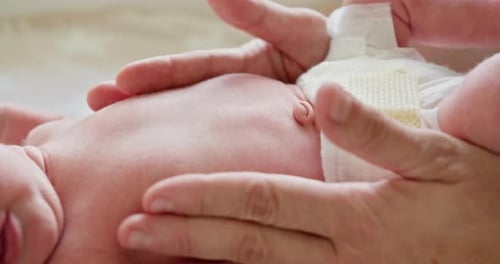 Baby Receiving Gentle Massage from Parent's Hands