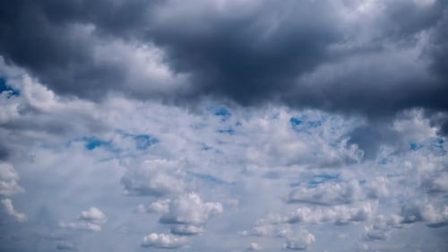 Clouds Moving Across the Sky on a Sunny Day