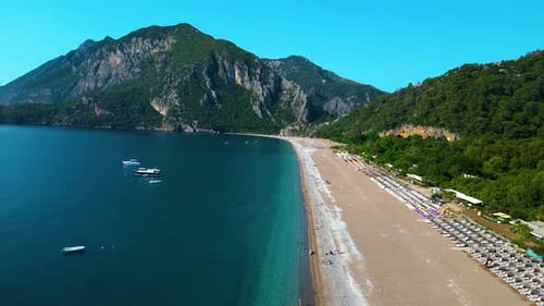 Aerial Drone View of a Serene Beach and Turquoise Sea