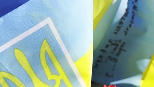 Many Small Flags of Ukraine with Names of the Dead War Against Russia Memorial of the Fallen