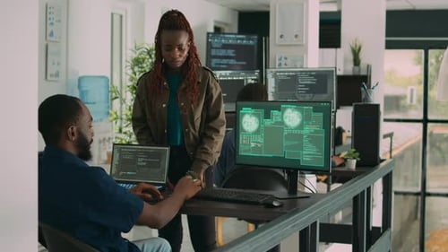Multiethnic Group of Program Coders Dealing with Hacked It System