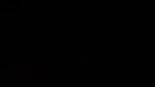 Abstract Light Particles on Dark Background