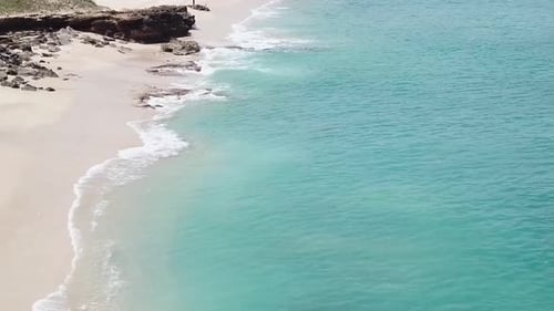 Coastal Beach with Turquoise Ocean Water Aerial View