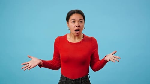Young Woman Expressing Confusion and Uncertainty