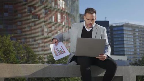 Confident Businessman Having Video Chat Online on Laptop Computer at Street. Serious