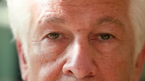 Senior Man Close Up Smiling At Camera