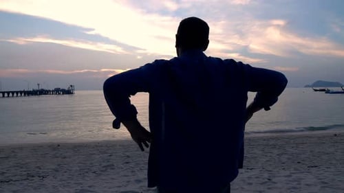 Man Stretching Arms and Admire Sunset on Beach, Super 240