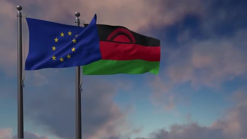 European Union and Malawi Flags Waving on Flagpoles Against Sky