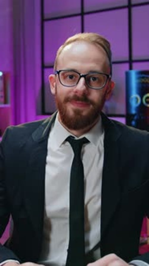 Business Portrait of Attractive Smiling Professional Experienced Bearded Office Manager in Dark