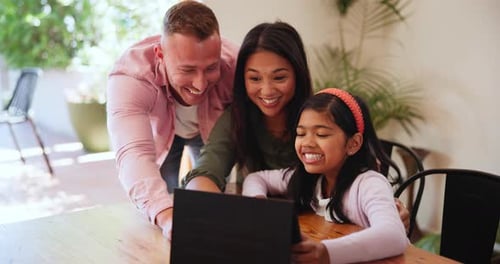 Smiling Family Enjoys Tablet Together at Home