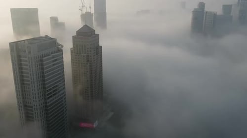 Skyscrapers rising above the clouds Aerial Hyperlapse mode, Tel Aviv