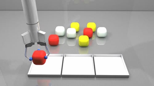 Bras robotique triant des cubes colorés