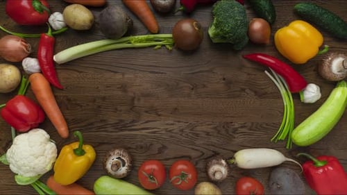Colorful Vegetables Being Arranged on a Table