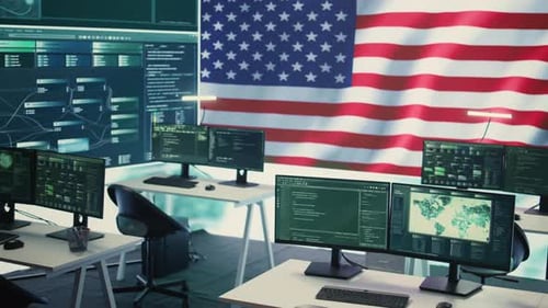 Empty Cybersecurity Office With Monitors and US Flag