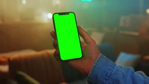 Close Up Man Hands Using a Mobile Phone with Green Screen Social Media Smartphone Mock Up