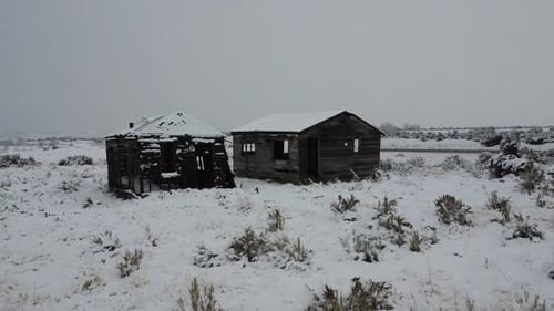 Old Abandoned Rustic Building In The Snow