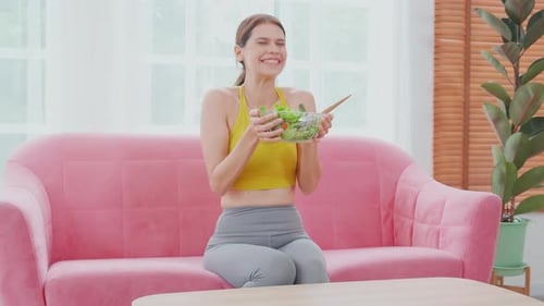Woman Enjoying a Healthy Salad at Home