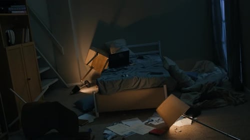 Messy Room with Overturned Furniture and Scattered Papers