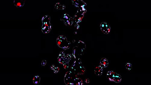 Des lots de différentes couleurs encerclent une explosion sur un fond de couleur noire