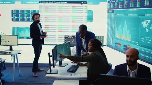 Business Associates Evaluating Key Performance Indicators Within the Company