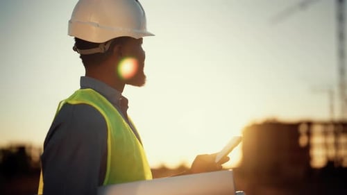 Professional Architect or Engineer Surfing Internet By Smart Home Construction Modern Technology for