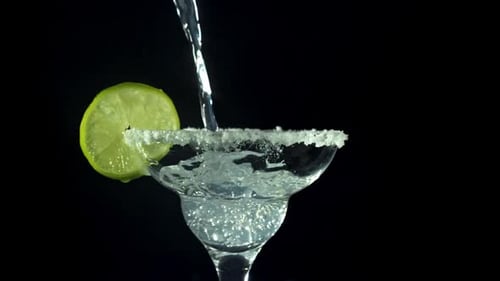 Margarita Cocktail Drink Being Poured into Glass