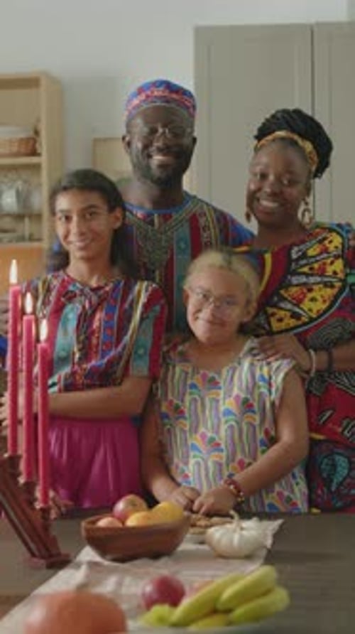 Happy Family Smiling Together at Home Portrait