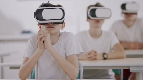 Teens Using VR Headsets in a Classroom