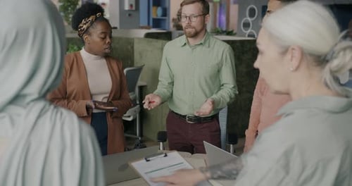 Diverse Team Brainstorming and Collaborating in Office